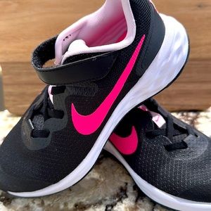 Girls black and pink Nike revolution running shoe